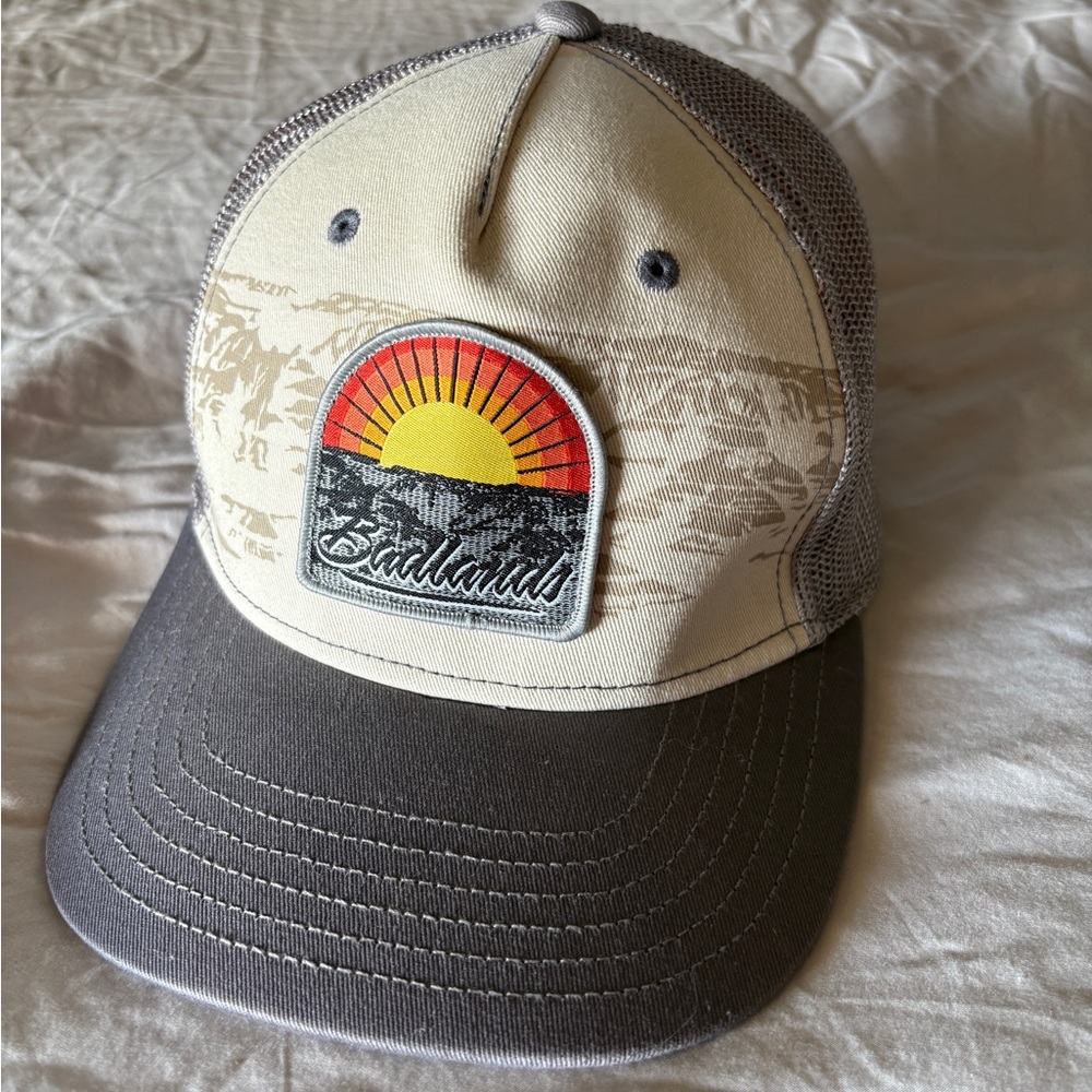 Badlands 
Gray and Cream Trucker Hat with Patch